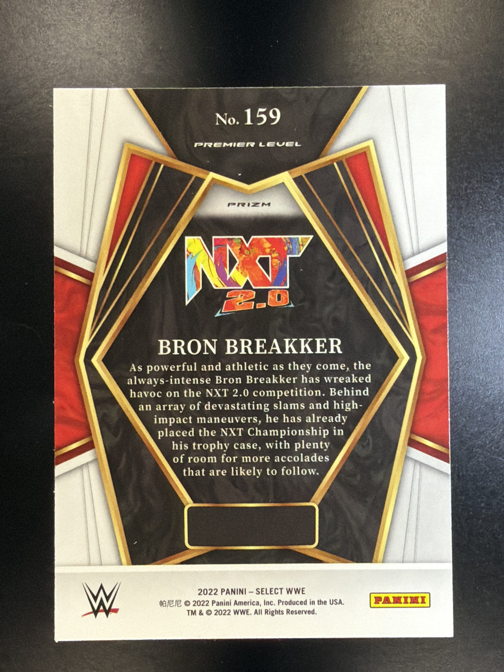 2022 Panini Select WWE #159 Bron Breakker Orange Flash Prizm