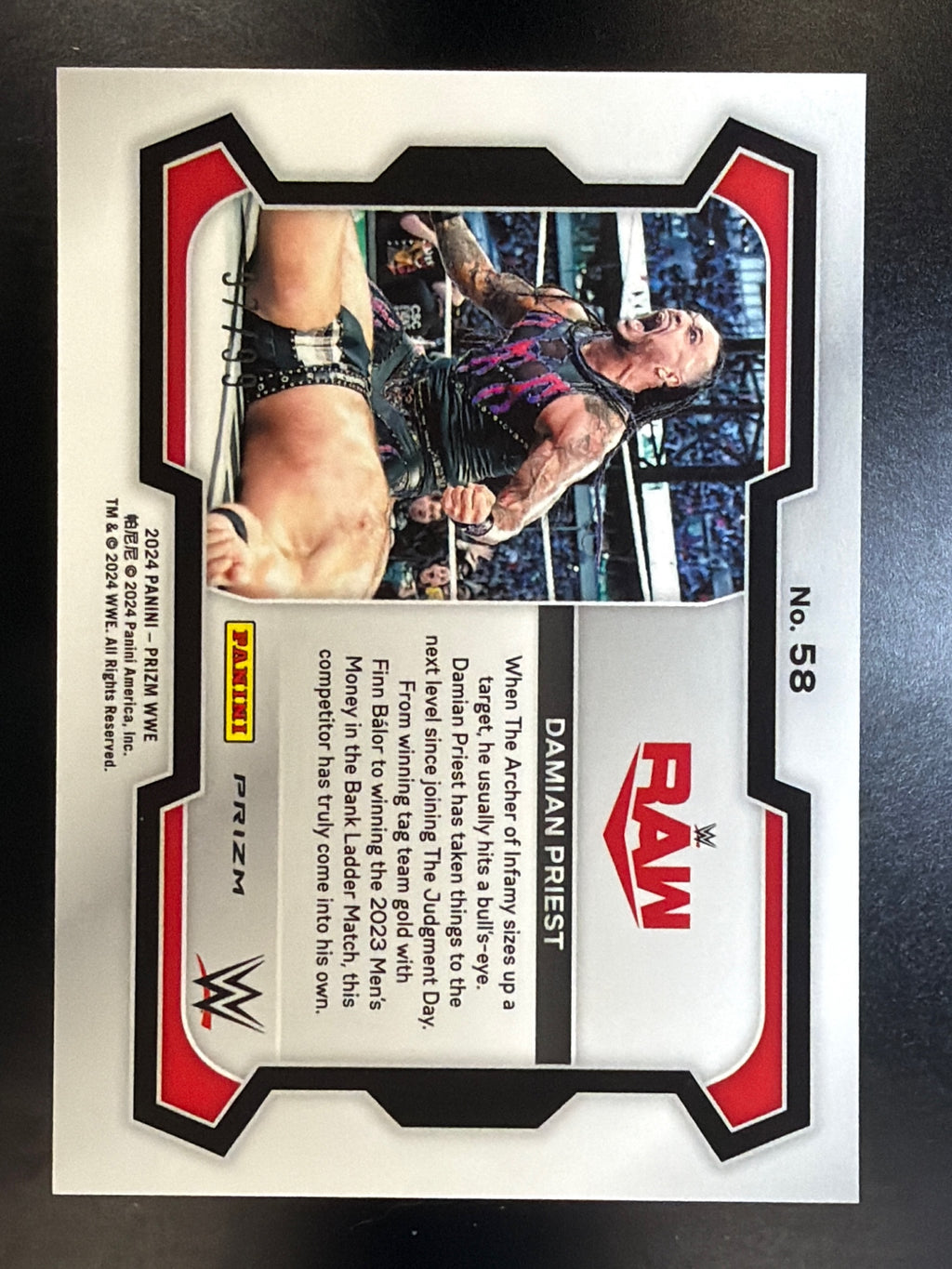 2024 Panini Prizm WWE #58 Damian Priest Orange Prizms #/99