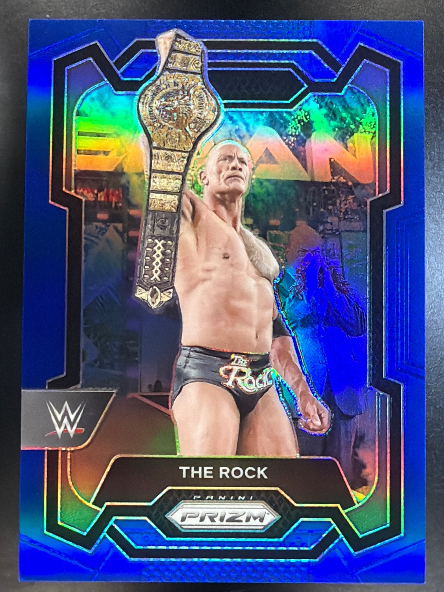 2024 Panini Prizm WWE #193 The Rock Blue Prizms #/199