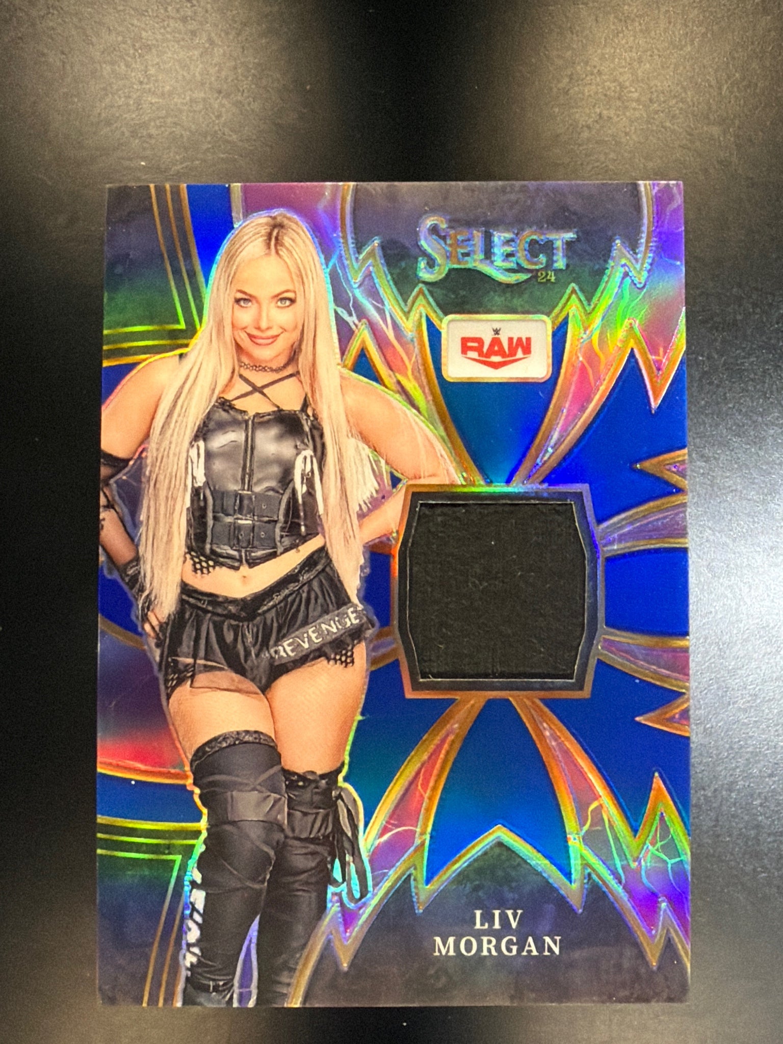 2024 Panini Select WWE #SP-LVM Liv Morgan Sparks Memorabilia Blue Prizms #/49