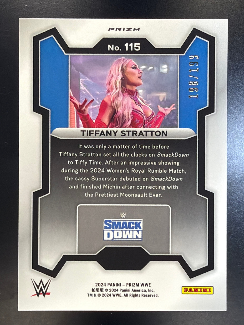 2024 Panini Prizm WWE #115 Tiffany Stratton Blue Prizms #/199