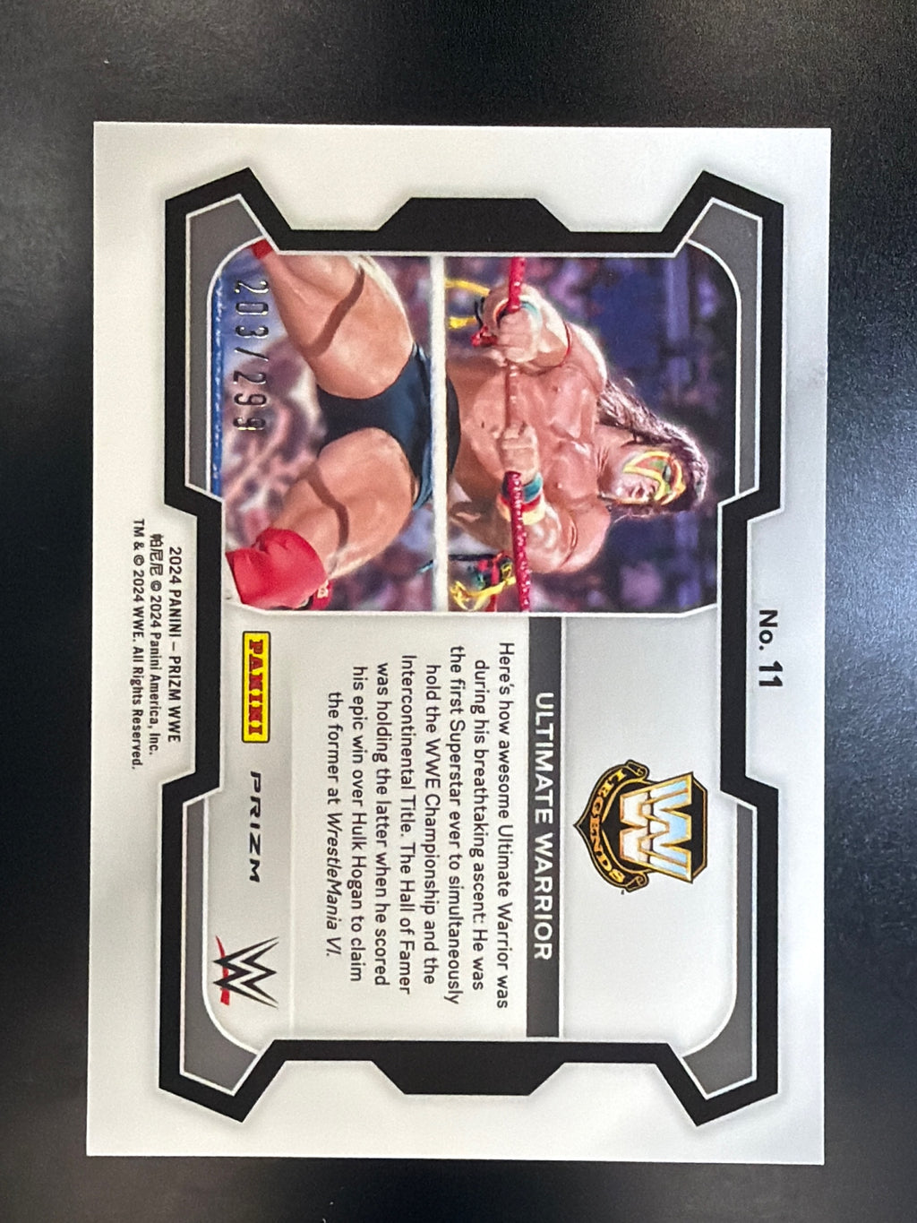 2024 Panini Prizm WWE #11 Ultimate Warrior Red Prizms #/299