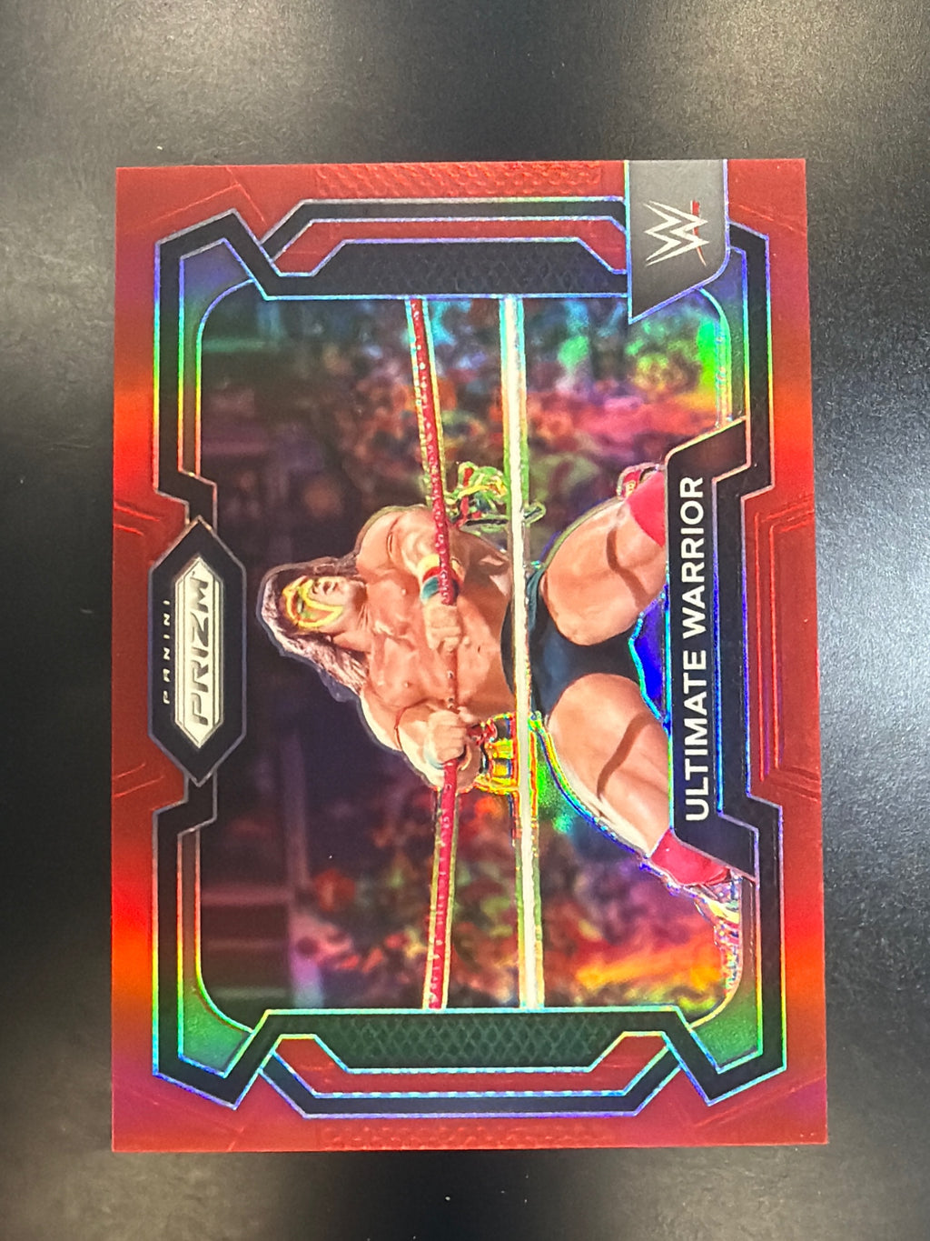 2024 Panini Prizm WWE #11 Ultimate Warrior Red Prizms #/299