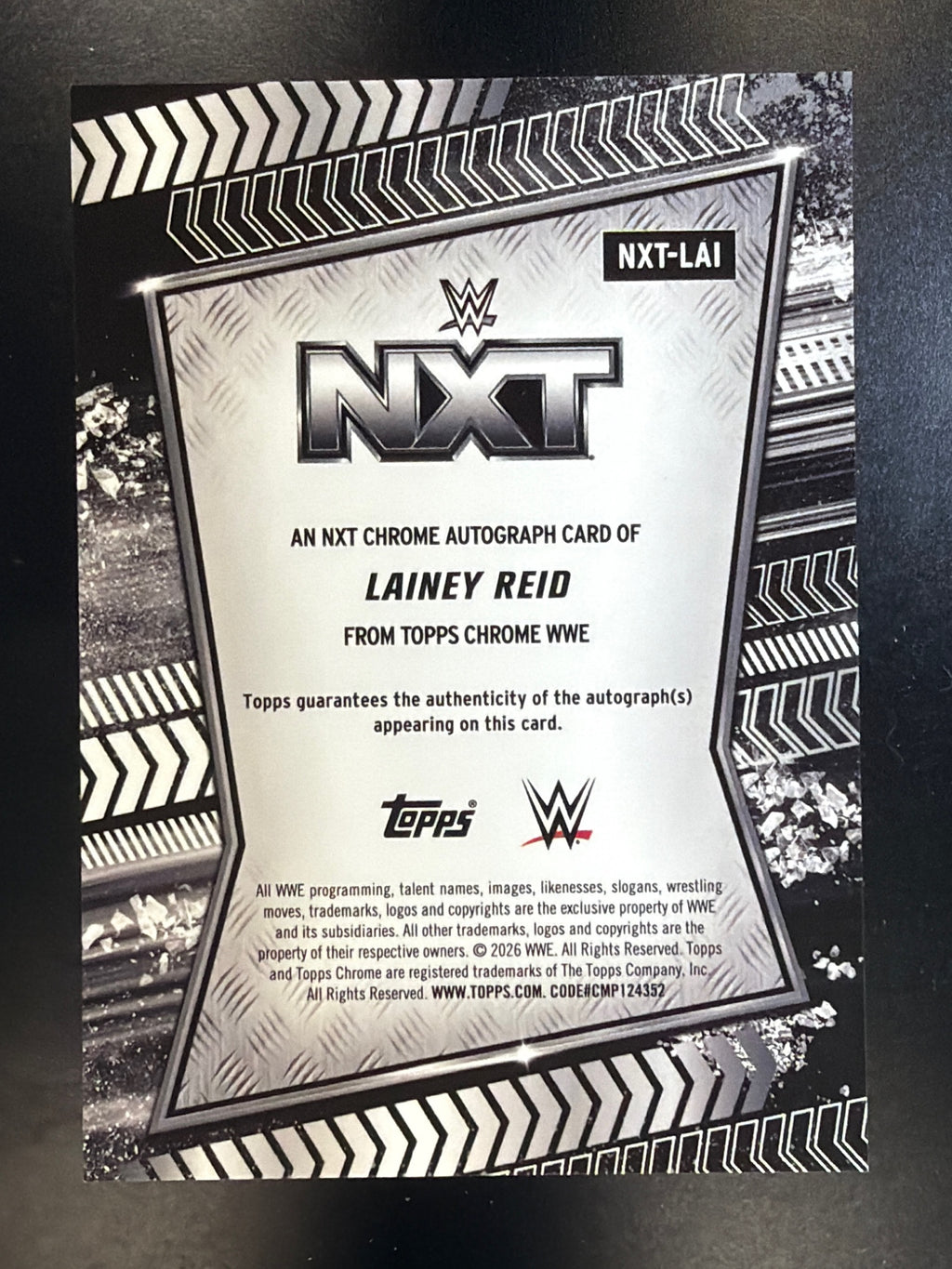 2026 Topps Chrome WWE #NXT-LAI Lainey Reid NXT Autographs Green Refractor #/99