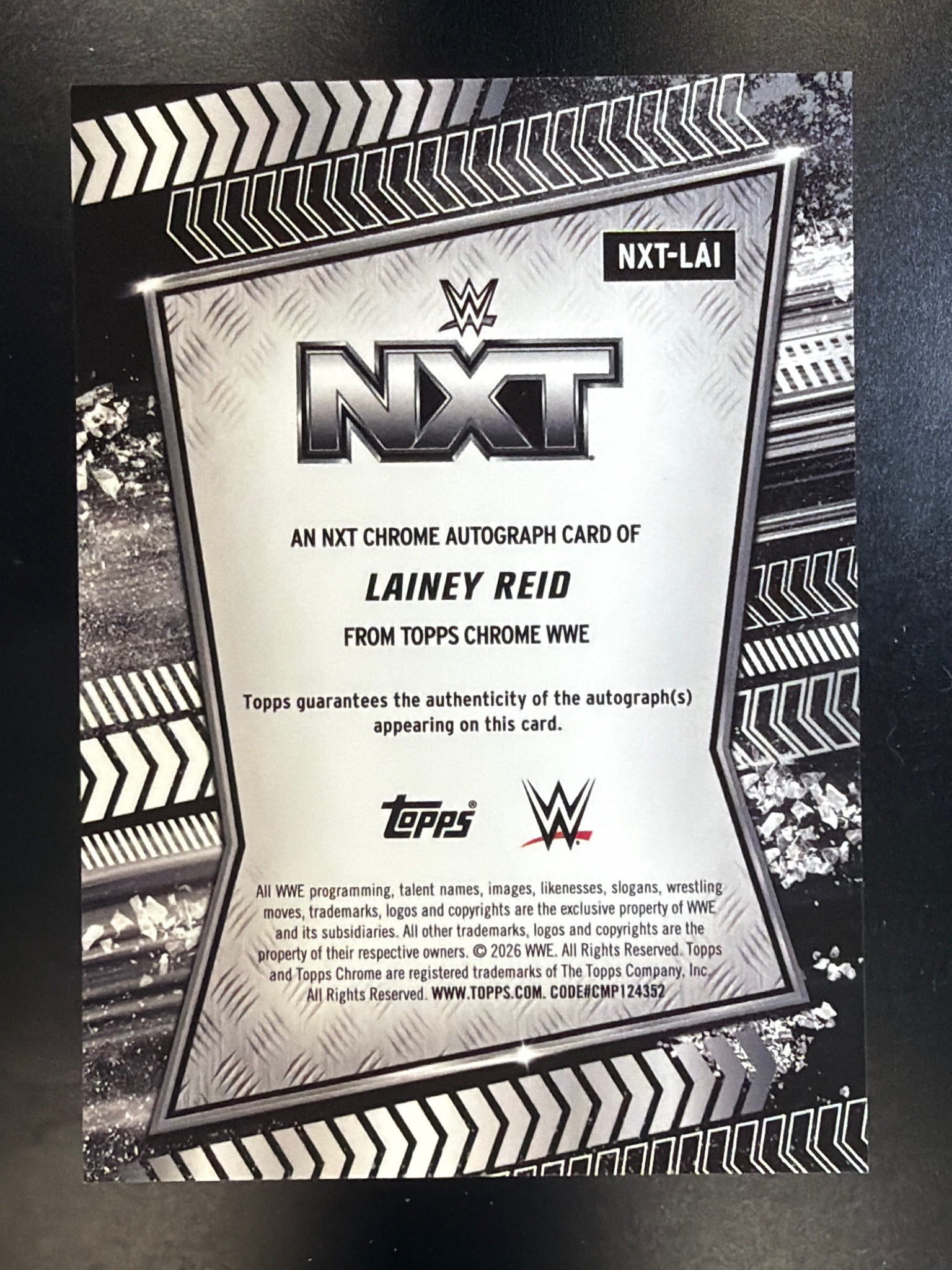 2026 Topps Chrome WWE #NXT-LAI Lainey Reid NXT Autographs Green Refractor #/99