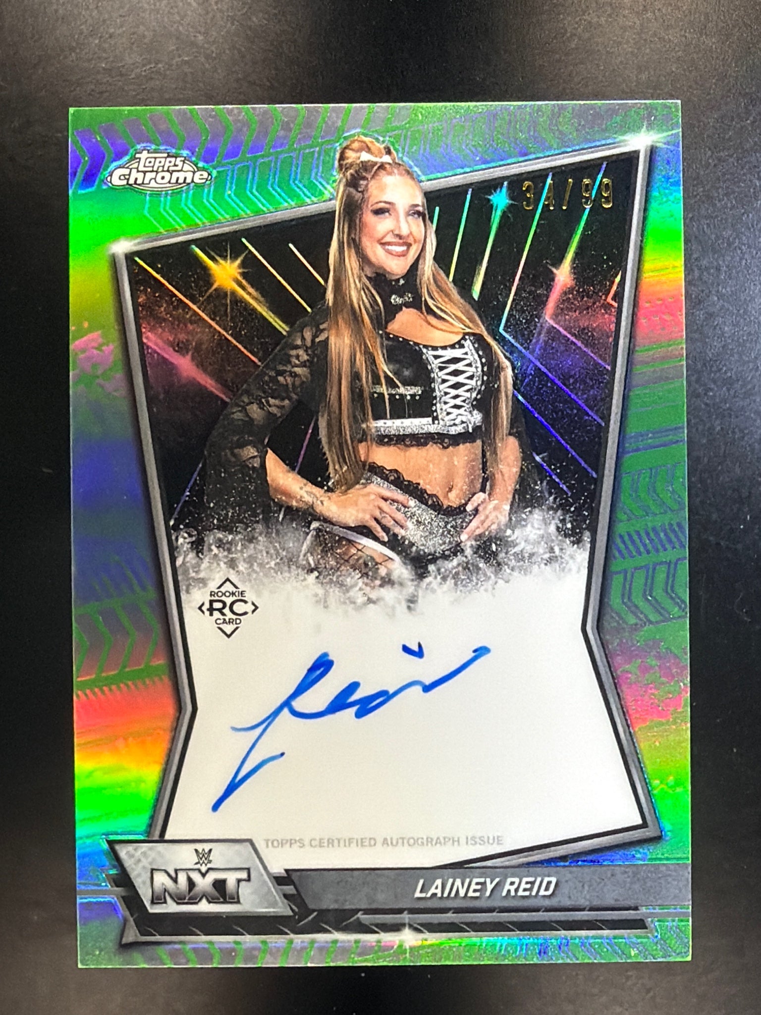 2026 Topps Chrome WWE #NXT-LAI Lainey Reid NXT Autographs Green Refractor #/99