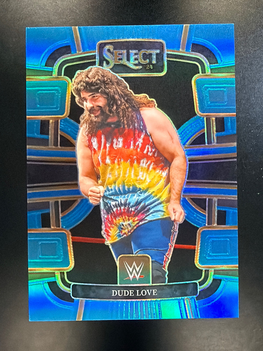 2024 Panini Select WWE #65 Dude Love Light Blue Prizms #/249
