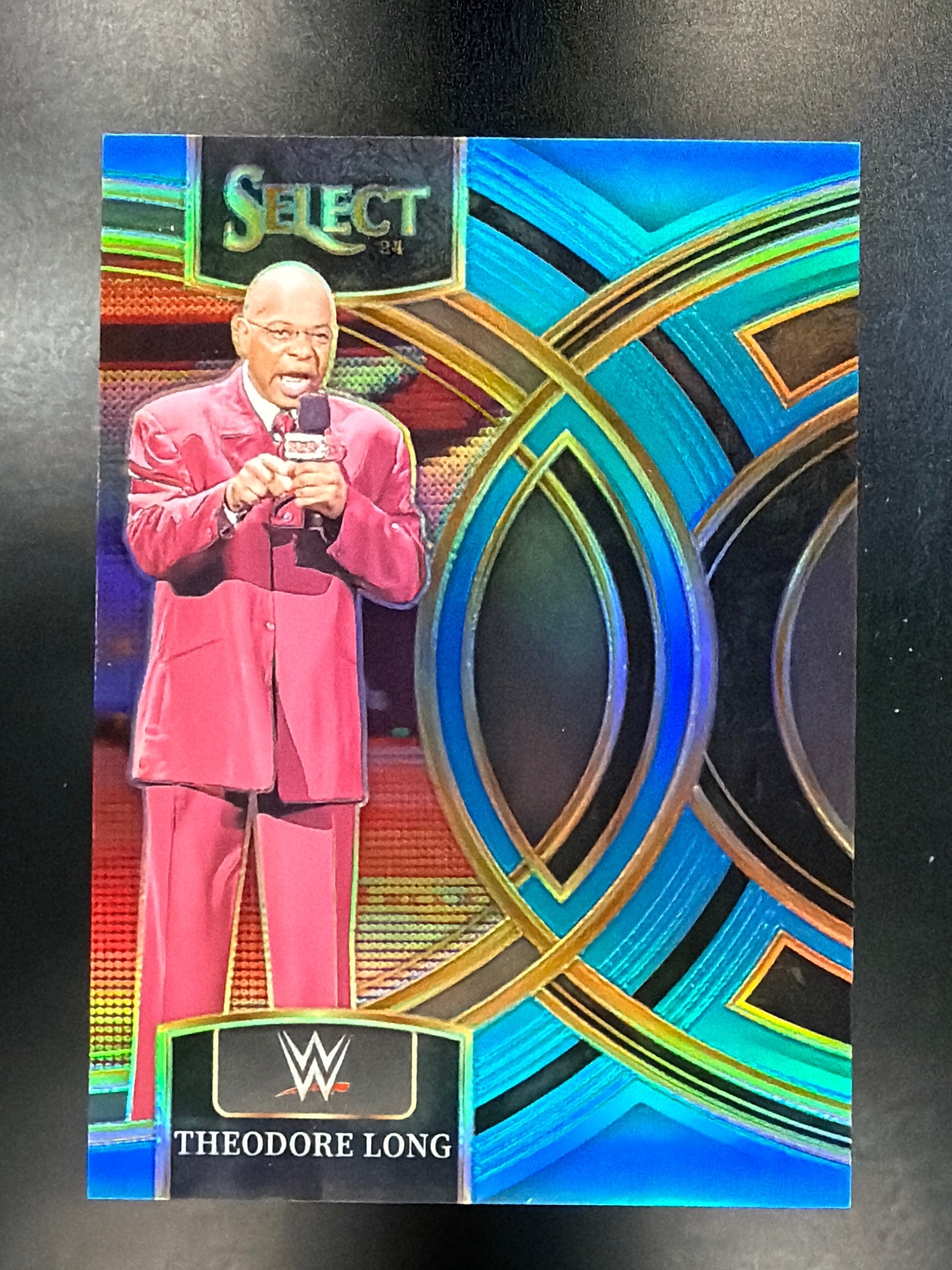 2024 Panini Select WWE #156 Theodore Long Blue Prizms #/199