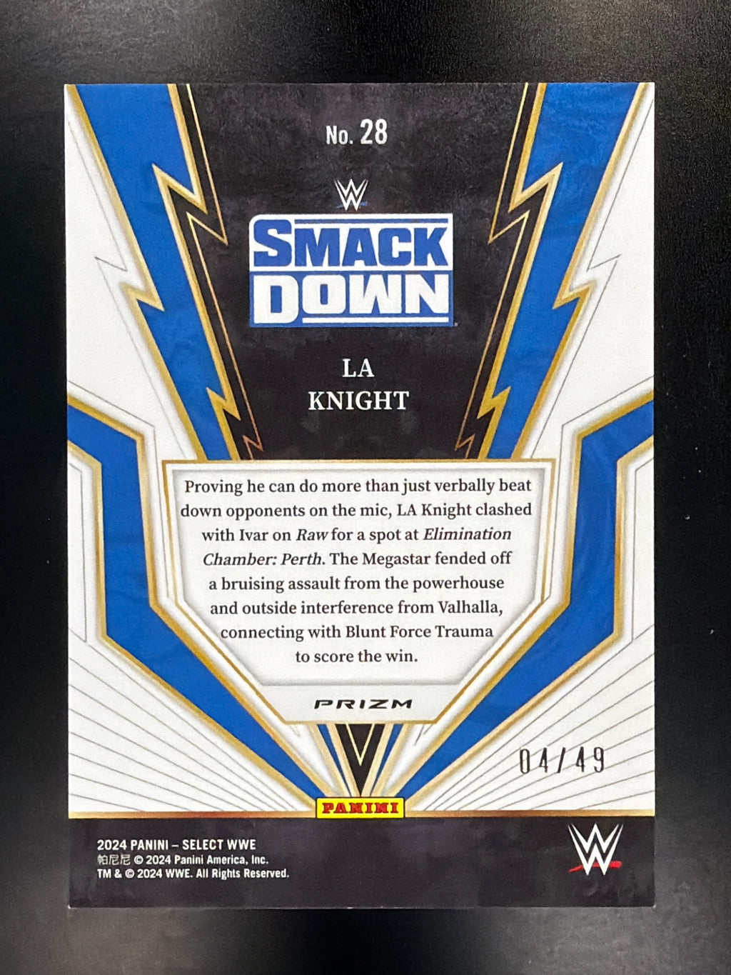 2024 Panini Select WWE #28 LA Knight Turbo Charged Blue Prizms #/49