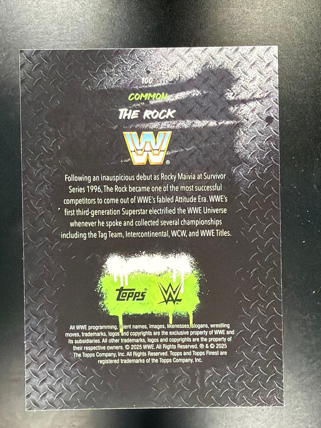2025 Topps Finest WWE #100 The Rock Blue Checkerboard #/149