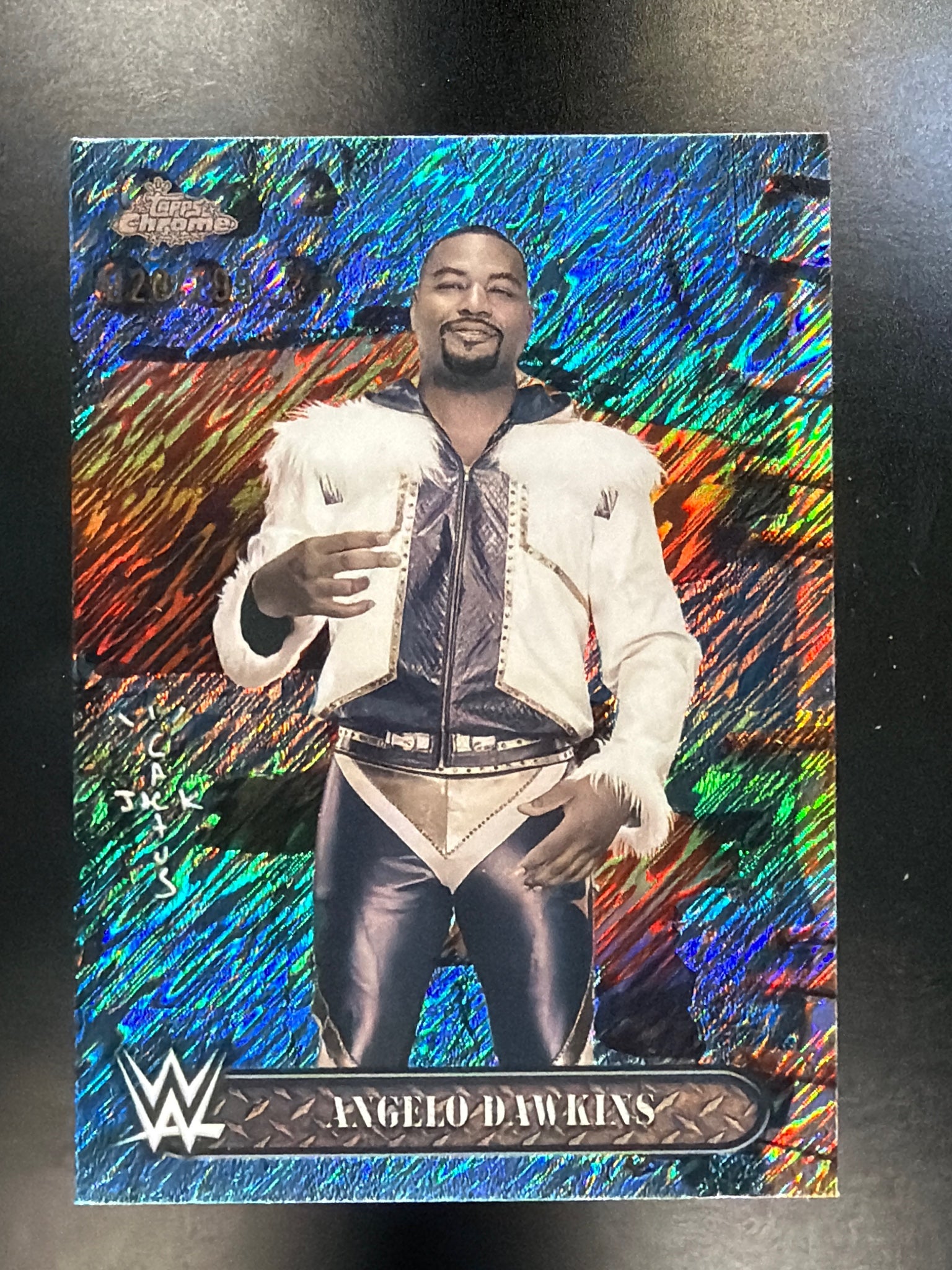 2025 Topps Chrome WWE x Cactus Jack #99 Angelo Dawkins Aqua Shimmer #/199