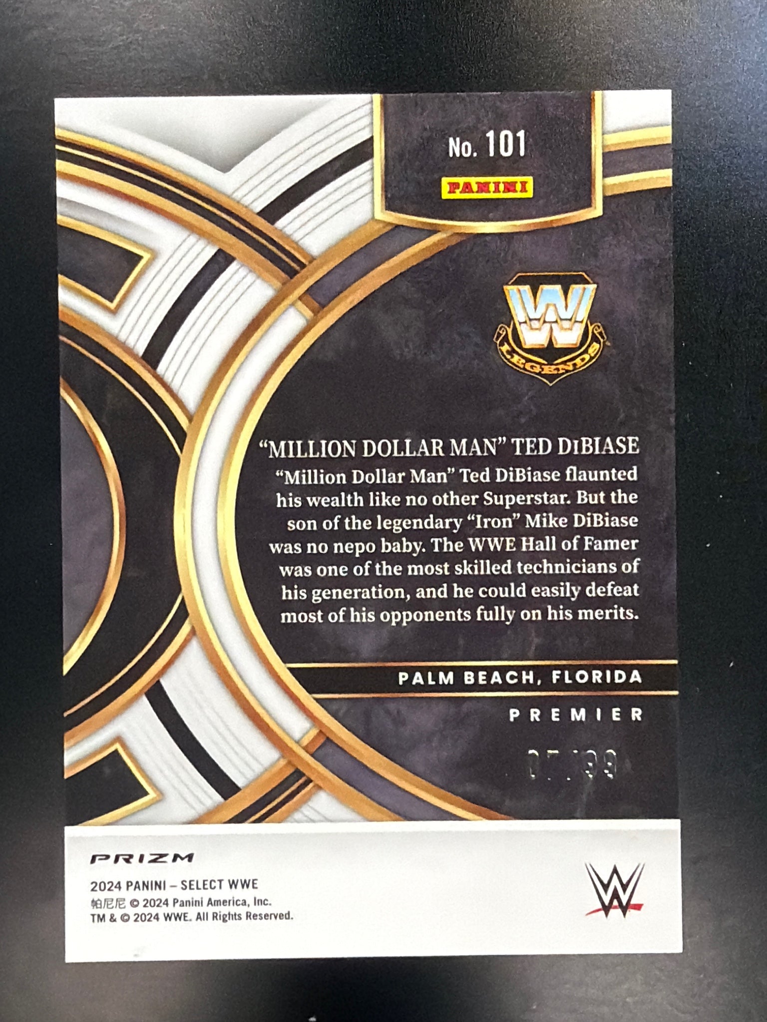 2024 Panini Select WWE #101 "Million Dollar Man" Ted DiBiase Purple Prizms #/99