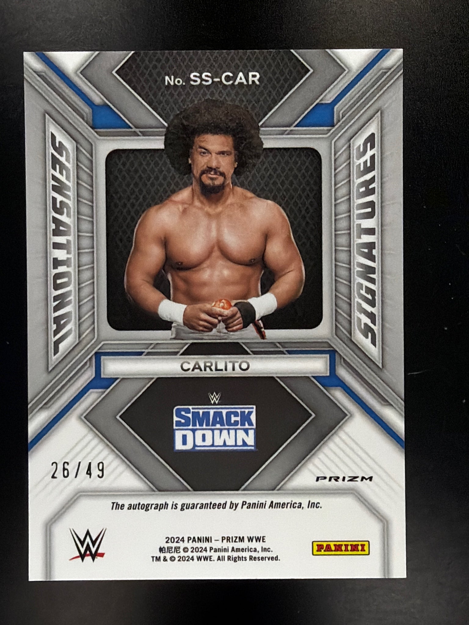 2024 Panini Prizm WWE #SS-CAR Carlito Sensational Signatures Blue #/49