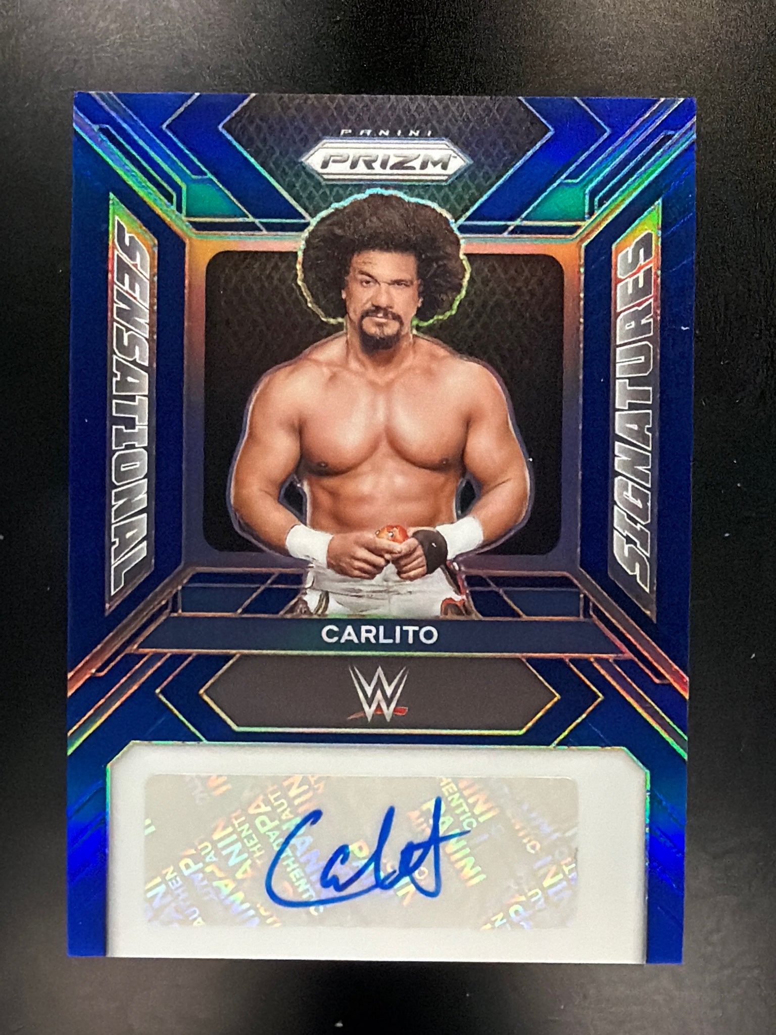 2024 Panini Prizm WWE #SS-CAR Carlito Sensational Signatures Blue #/49