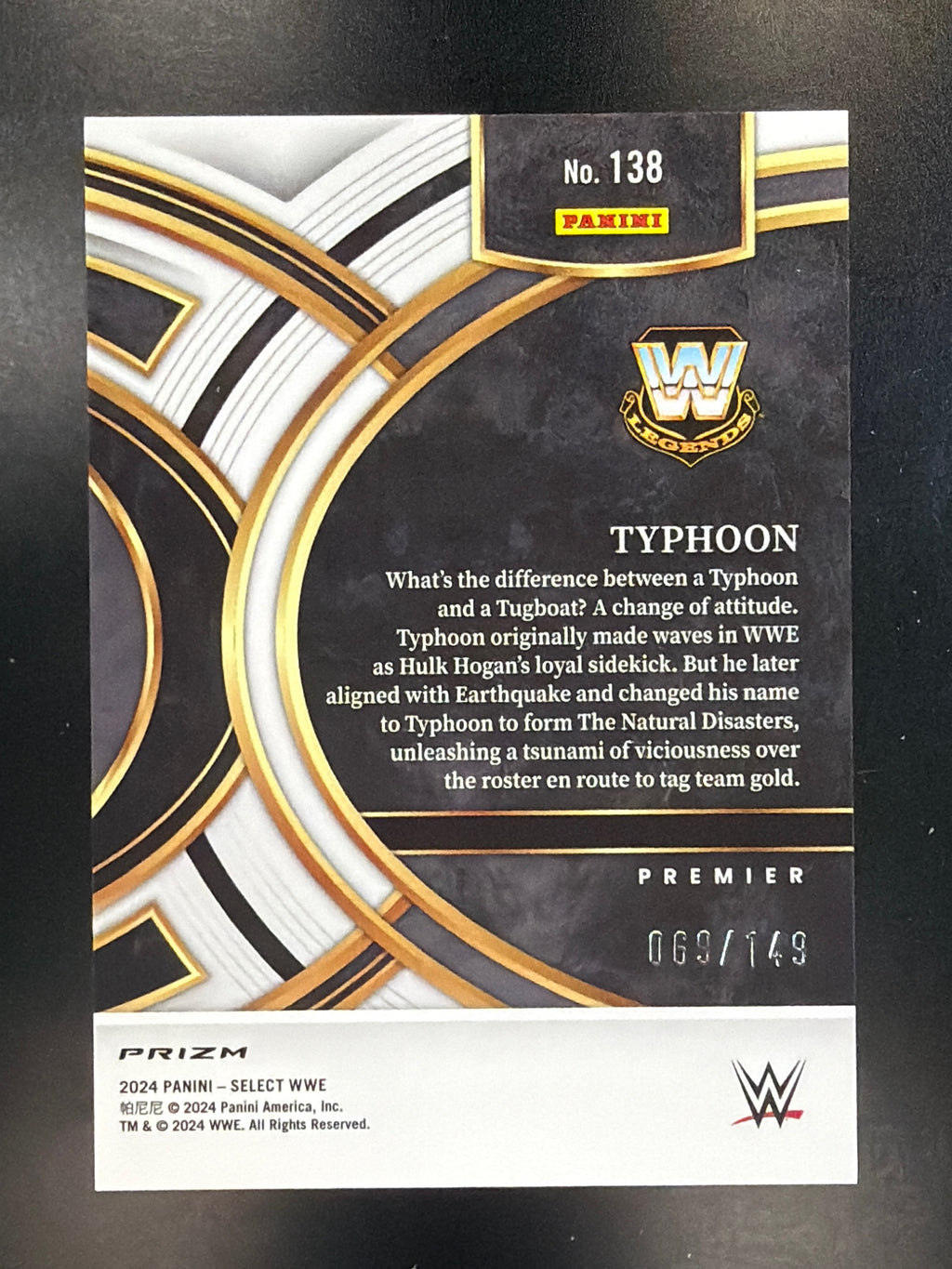 2024 Panini Select WWE #138 Typhoon Maroon Prizms #/149