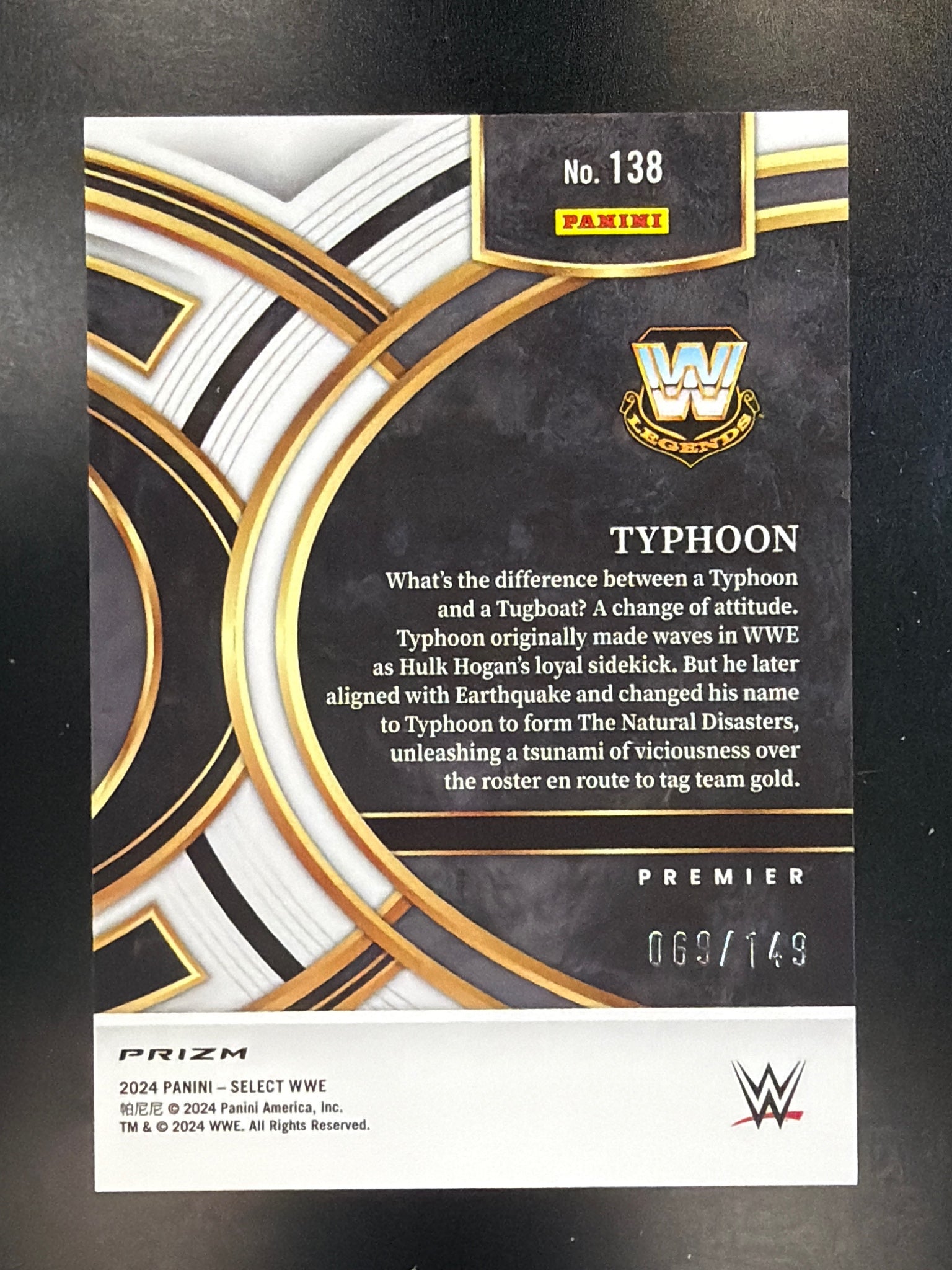 2024 Panini Select WWE #138 Typhoon Maroon Prizms #/149