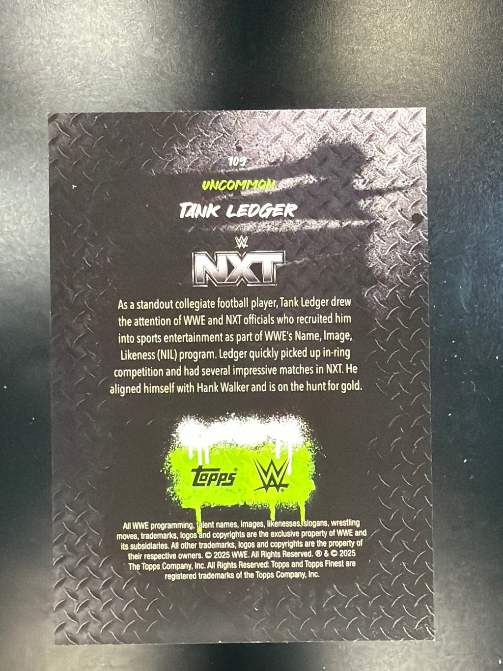 2025 Topps Finest WWE #109 Tank Ledger Red/Black Vapor #/15