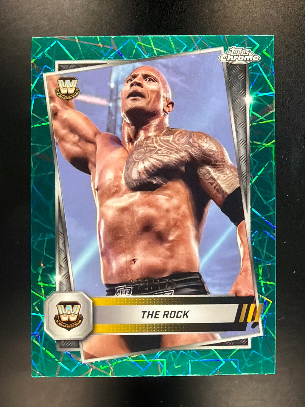 2025 Topps Chrome WWE #10 The Rock Teal Lazer Refractor #/175