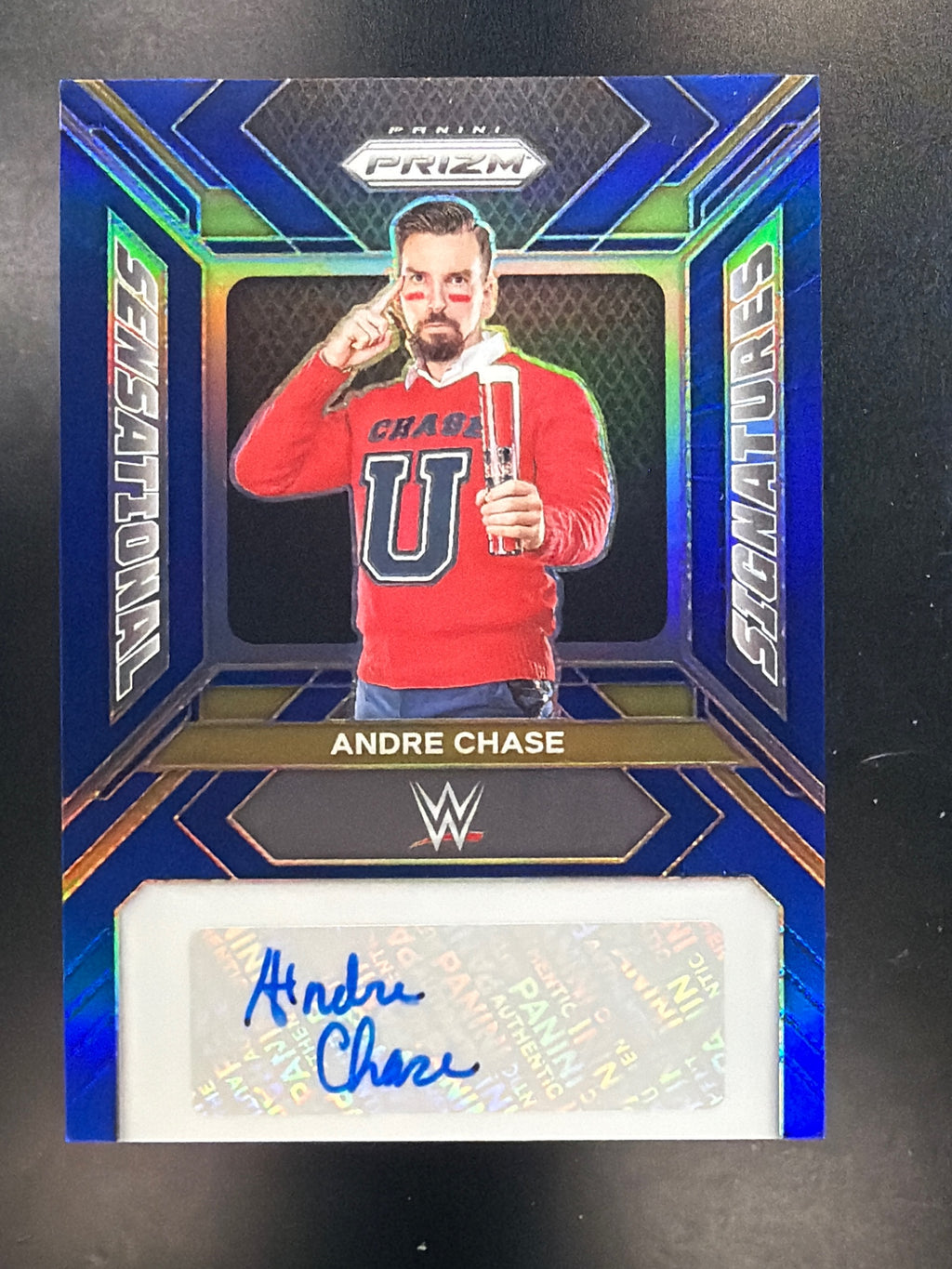 2024 Panini Prizm WWE #SS-ACH Andre Chase Sensational Signatures Blue #/49