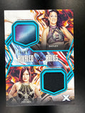 2025 Topps Exalted WWE #RR-BS Bayley / Iyo Sky Rivaled Relics Aqua #/99