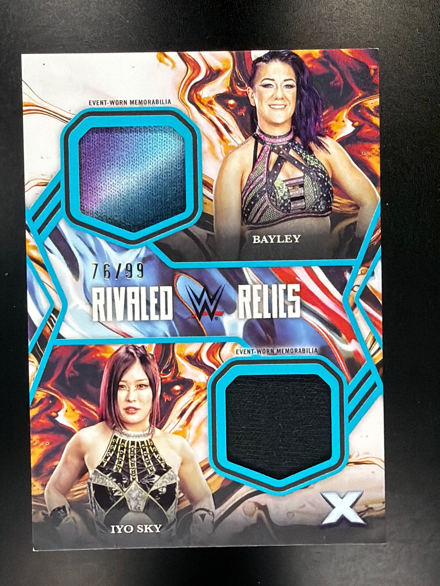 2025 Topps Exalted WWE #RR-BS Bayley / Iyo Sky Rivaled Relics Aqua #/99